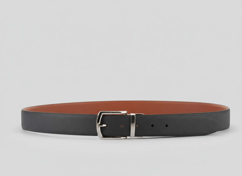 Grey leather belt with a silver buckle on a light gray background